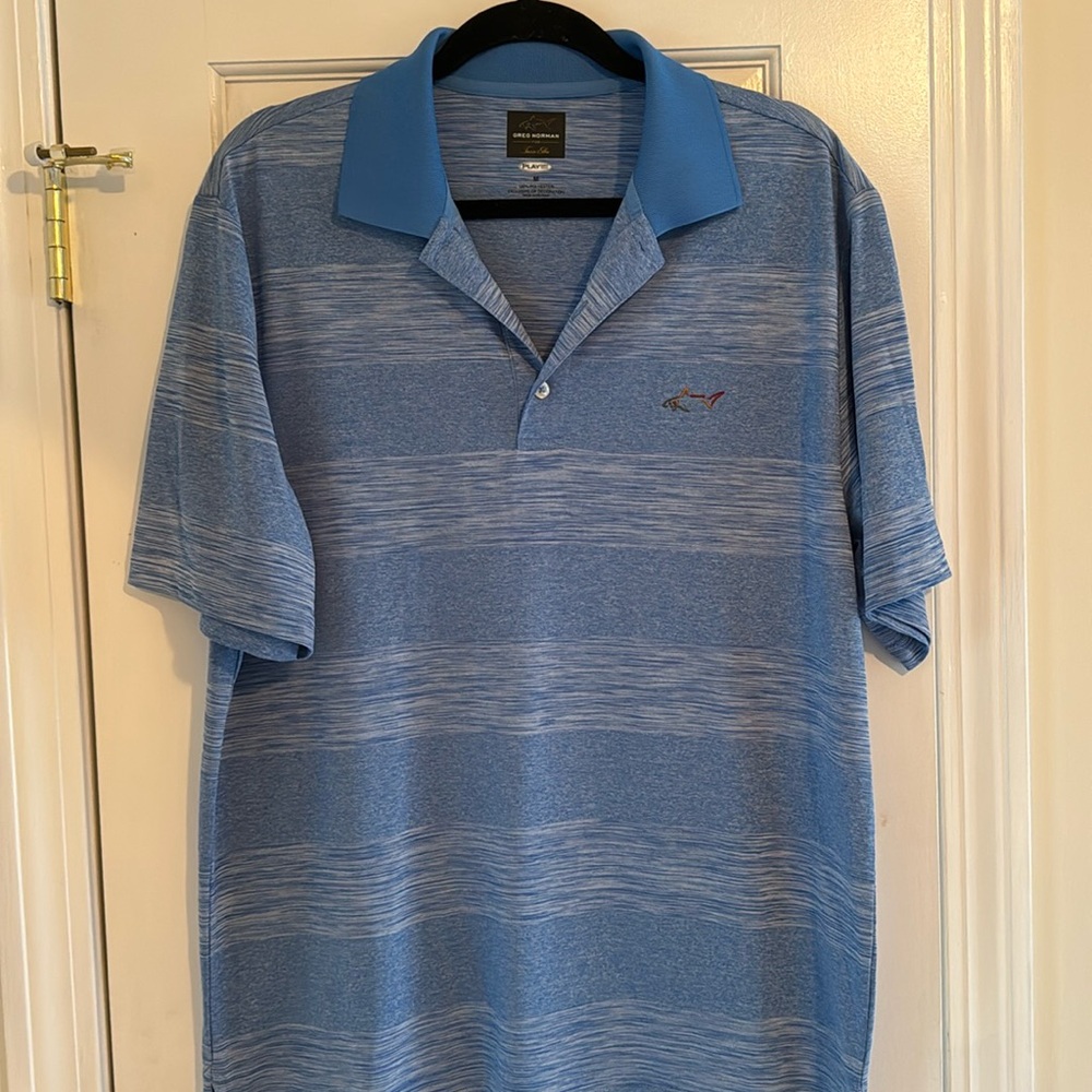 Men’s size medium short sleeve golf polo.